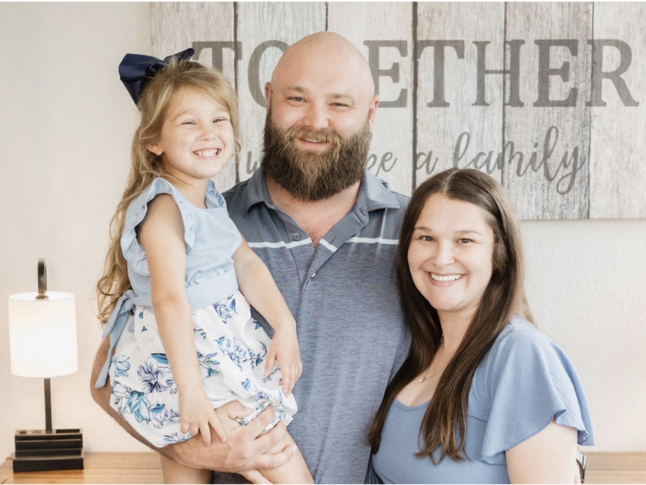 Gary and family smiling together