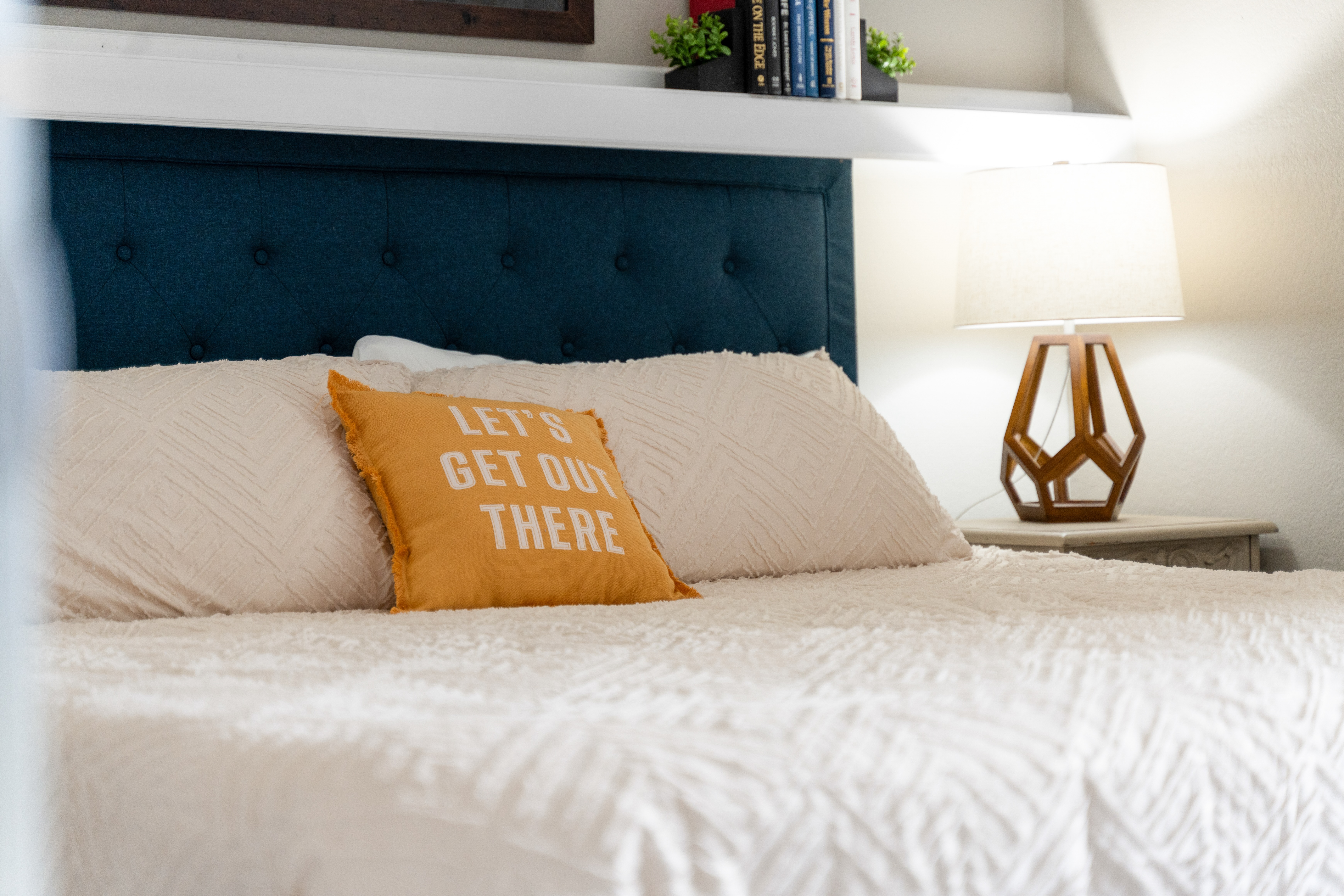 King-size bed with high-quality mattress in Branson vacation rental bedroom