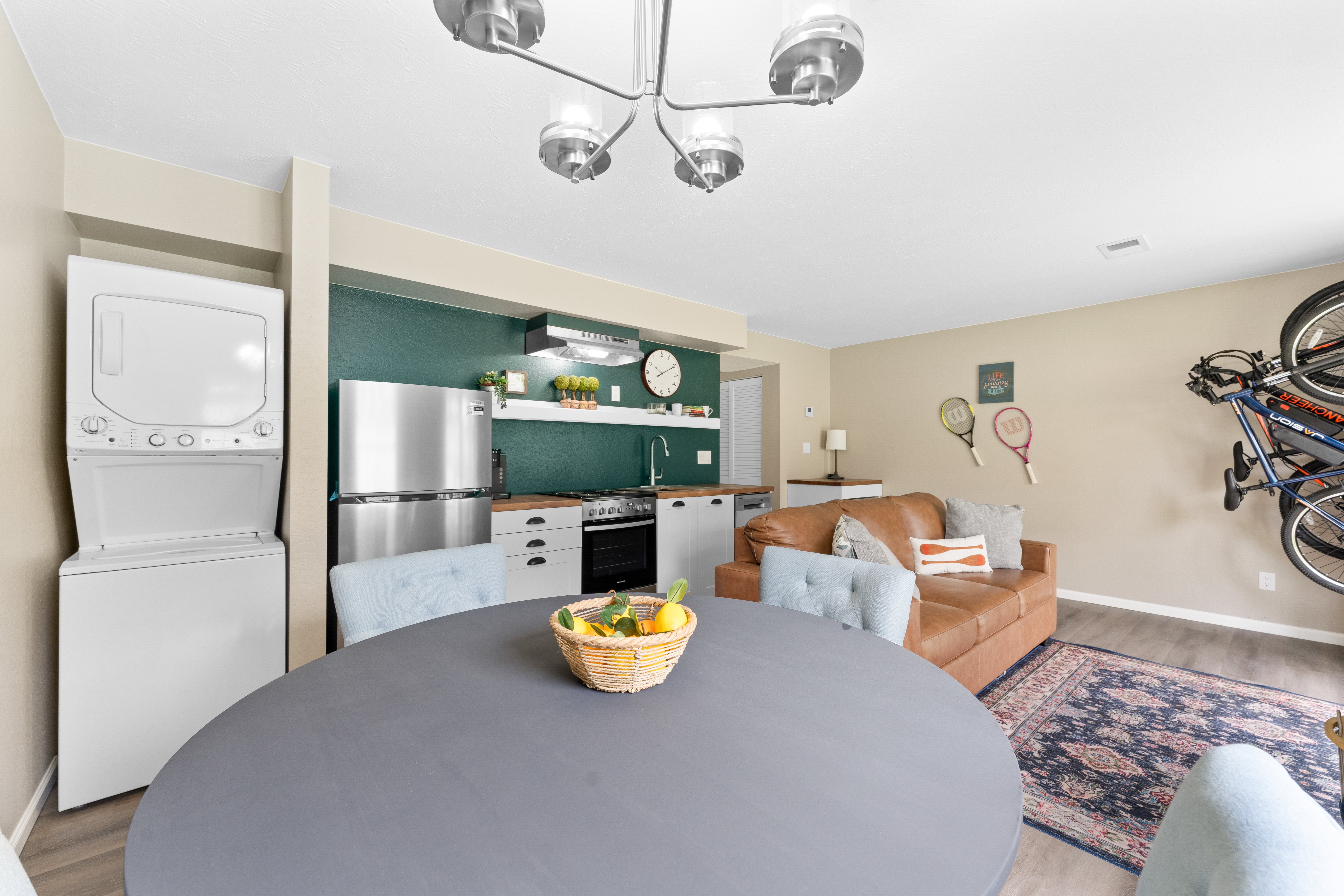 Open concept dining and living space in Branson short-term rental with compact layout