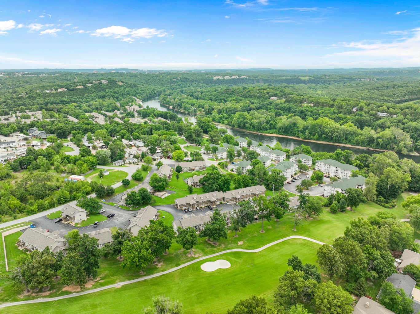 Aerial view of condos and golf course near Lake Taneycomo in Branson, Missouri.